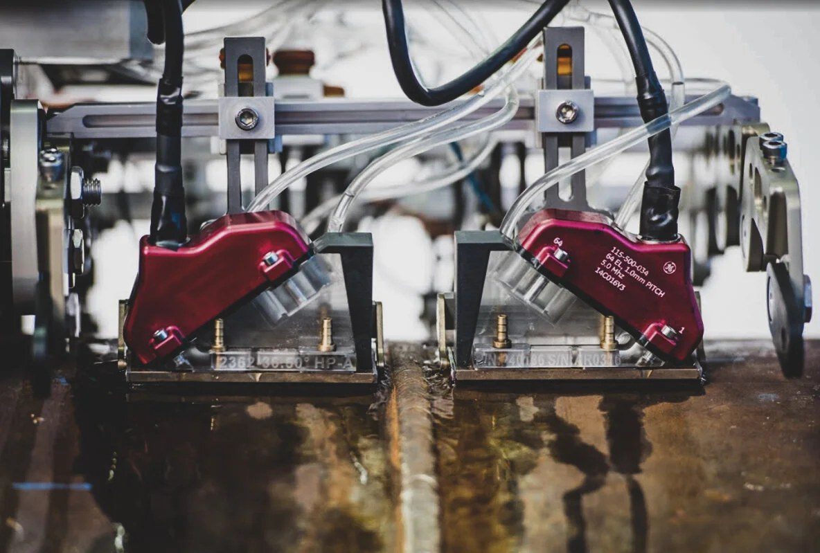 Phased-array ultrasonic probe wedges on an automated ultrasonic (AUT) scanning frame