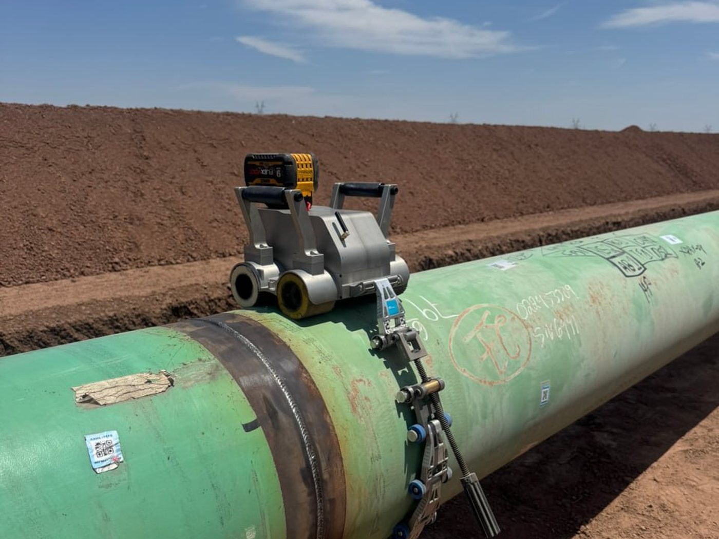 Band-mounted digital radiography system on a pipeline girth weld on a U.S. right-of-way